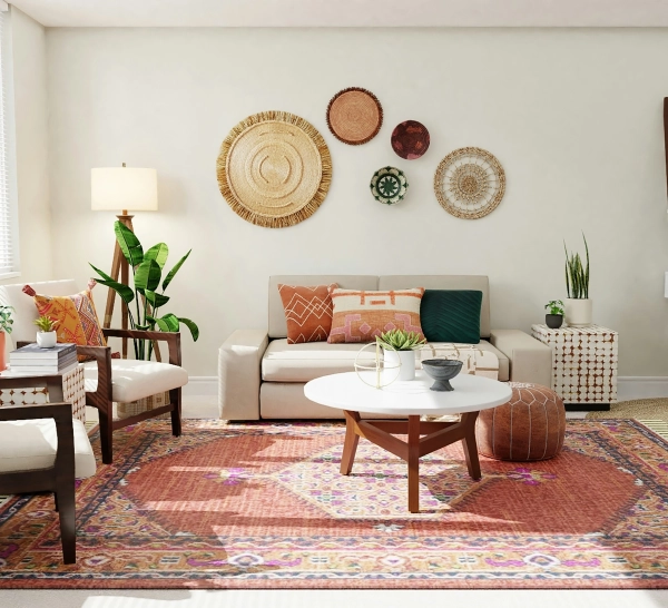 Sala acogedora con tapete grande, cojines y decoración cálida que transforma un departamento rentado en un espacio personal.